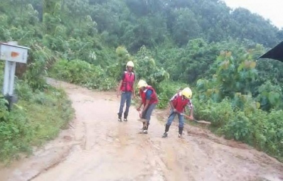 Disaster Management Team clearing landslides to reach Chitrabari, village of Sabroom.
